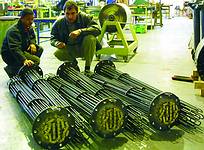 Projects: Ulf Hitzeroth with factory operator, Carl Rhoda, inspecting large immersion elements before delivery